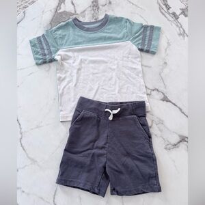 Green and White Striped T-Shirt with Gray Shorts